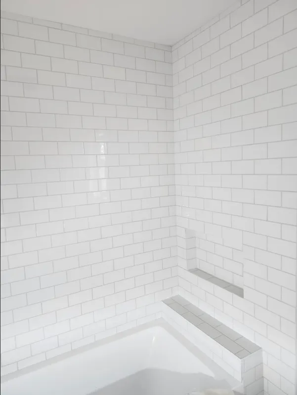 Heritage-style mosaic tile floor in Saanich bathroom renovation by NovoTile